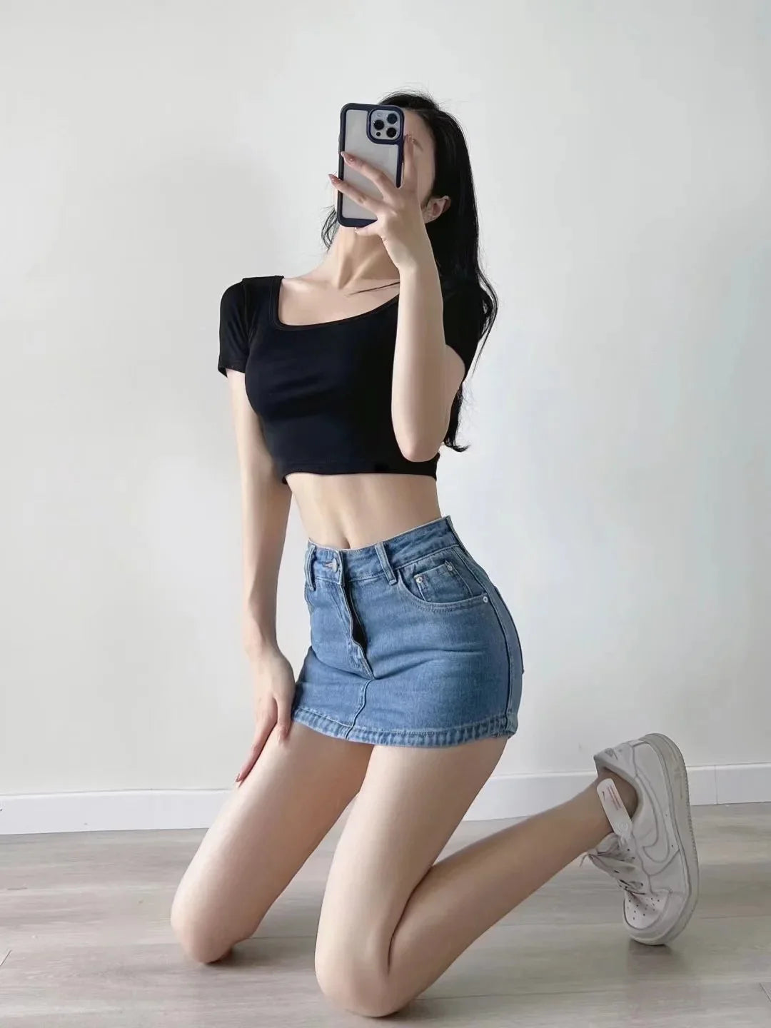 Women's High-Waisted Denim Mini Skirt, designed to offer a sexy and slim fit