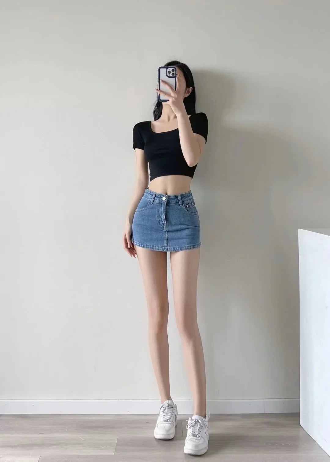 Women's High-Waisted Denim Mini Skirt, designed to offer a sexy and slim fit