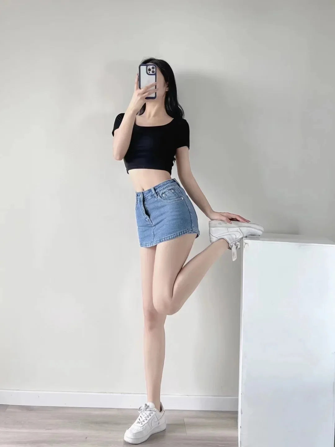 Women's High-Waisted Denim Mini Skirt, designed to offer a sexy and slim fit